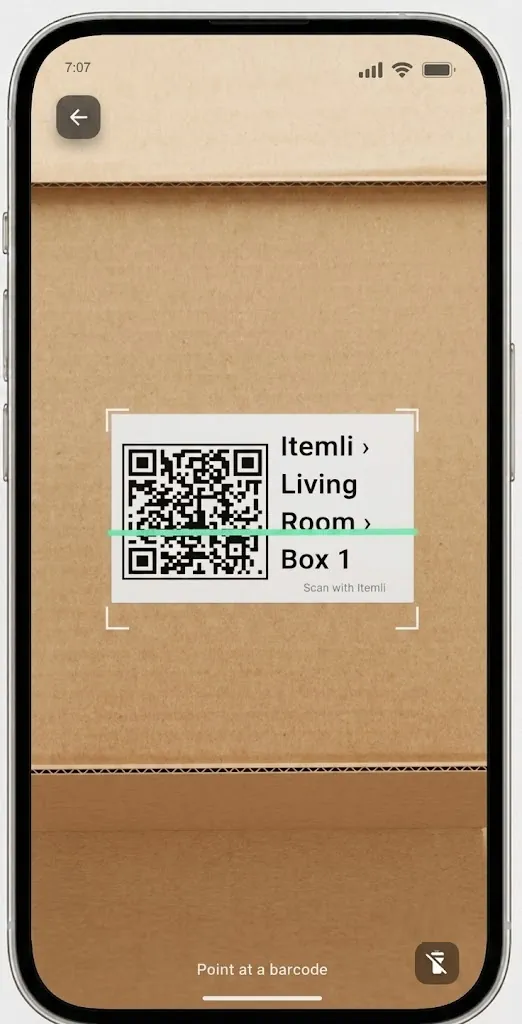 Scanning a box's QR code with Itemli to instantly see its contents while unpacking